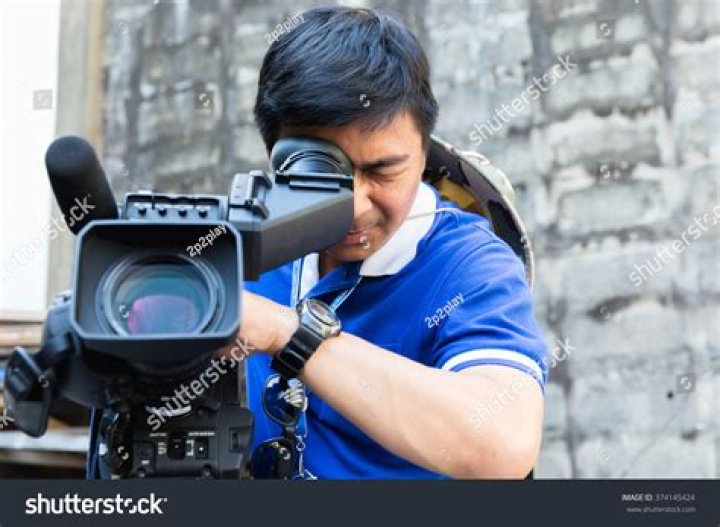 A cameraman filming as a locker is opened in Storage Wars
