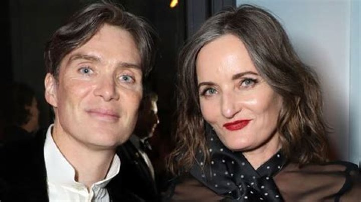 A collage image of Cillian Murphy looking surprised in Oppenheimer and Margot Robbie smiling in Barbie