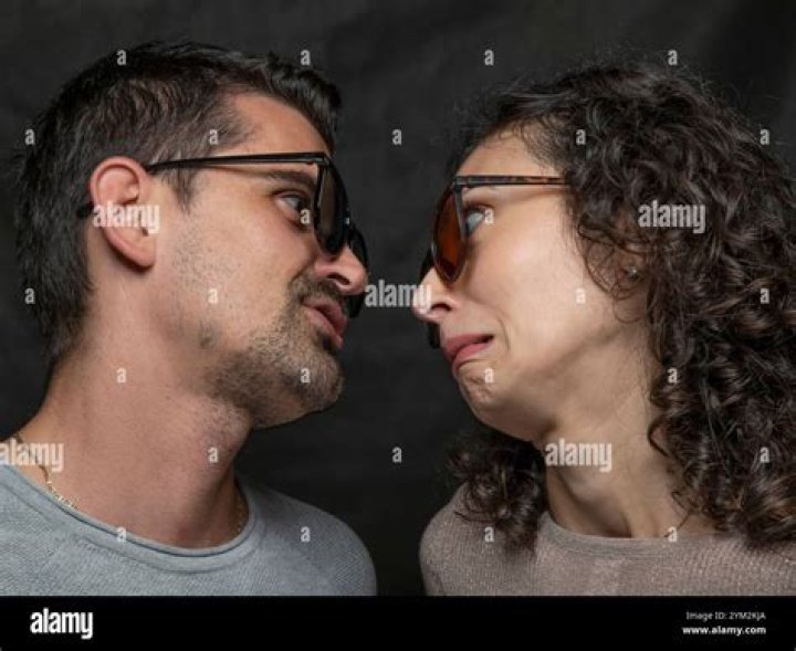 A man and a woman kiss in water in La Dolce Vita