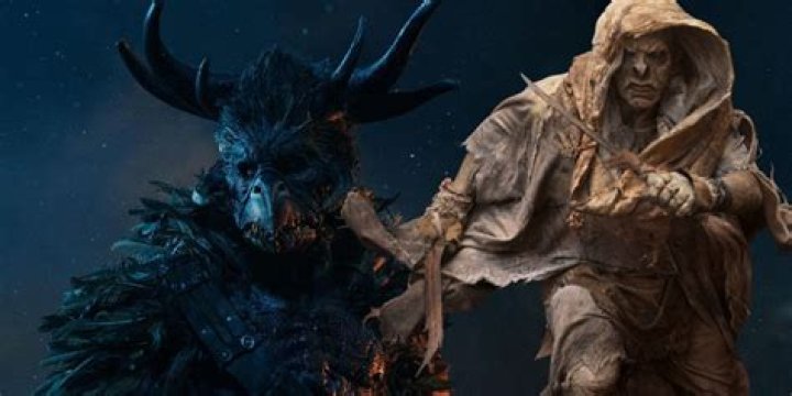 A Trolloc staring sideways in Wheel of Time and an Orc running in Lord of the Rings