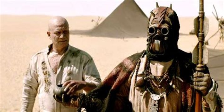A Tusken offering Boba Fett a drink, during Book Of Boba Fett