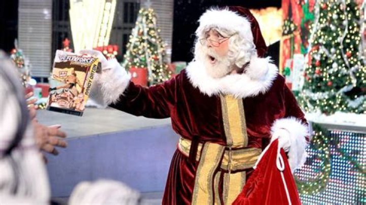 Alberto Del Rio hits Santa Claus (Mick Foley) with a car