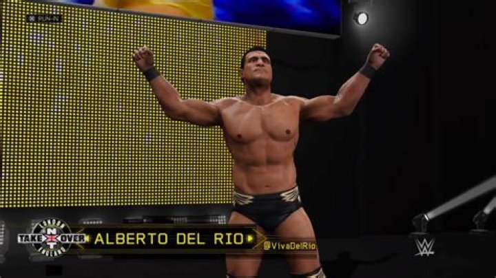Alberto Del Rio posing on the top turnbuckle