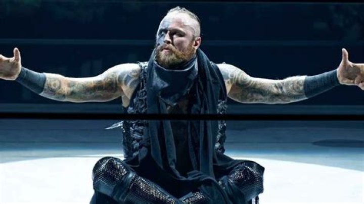 Aleister Black sitting in ring in WWE