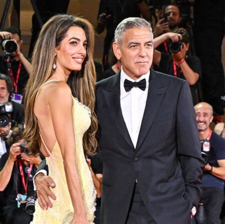 Amal Clooney Wears Yellow Gown at &lsquo;The Boys in the Boat&rsquo; Premiere