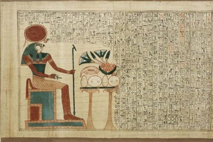 an ancient book of the dead is picked up by someone offscreen
