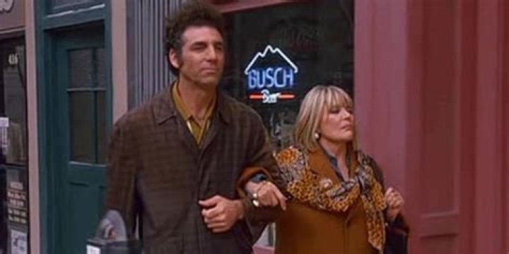 Babs and Cosmo Kramer walk down the street.