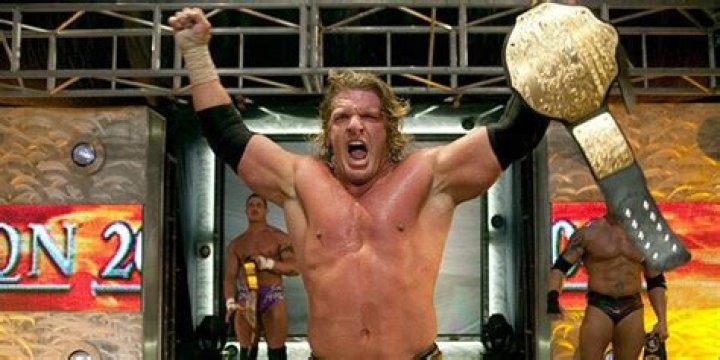 Batista celebrating after winning the 2014 Royal Rumble match.