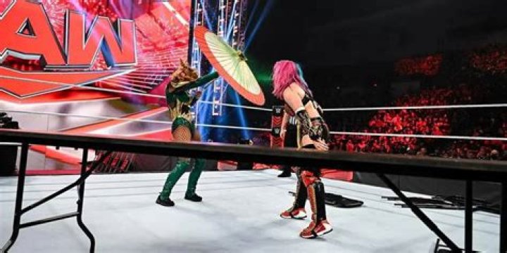 Becky Lynch blocks the mist 