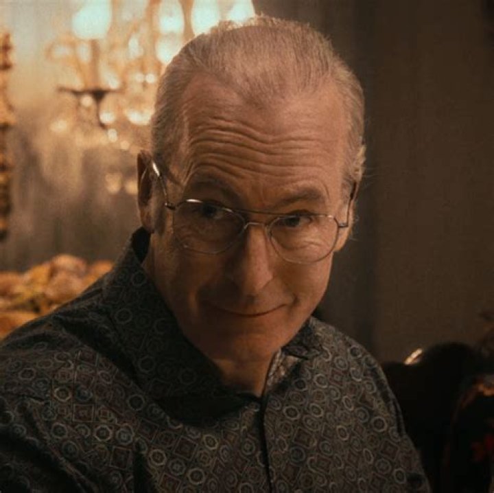 Bob Odenkirk as Uncle Lee Layne holding a drink and looking angry in The Bear season 2