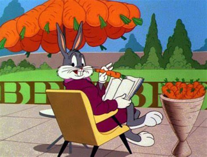 Bugs Bunny reads a book in The Looney Tunes Show