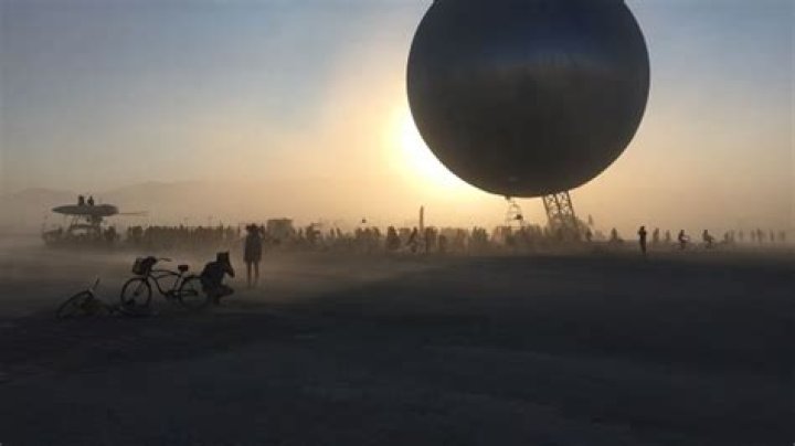 Burning Man festival draws attendees to desert despite storm floods