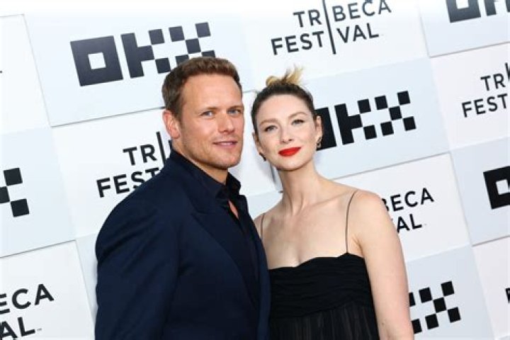 Caitr&iacute;ona Balfe as Claire Fraser and Sam Heughan as Jamie Fraser in Outlander season 7-1