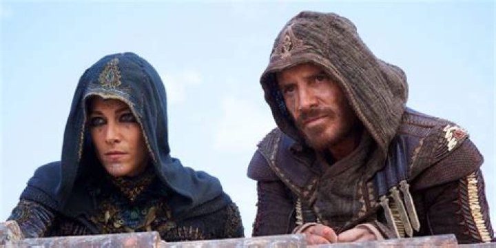 Cal sits on a rooftop in Assassin's Creed Movie