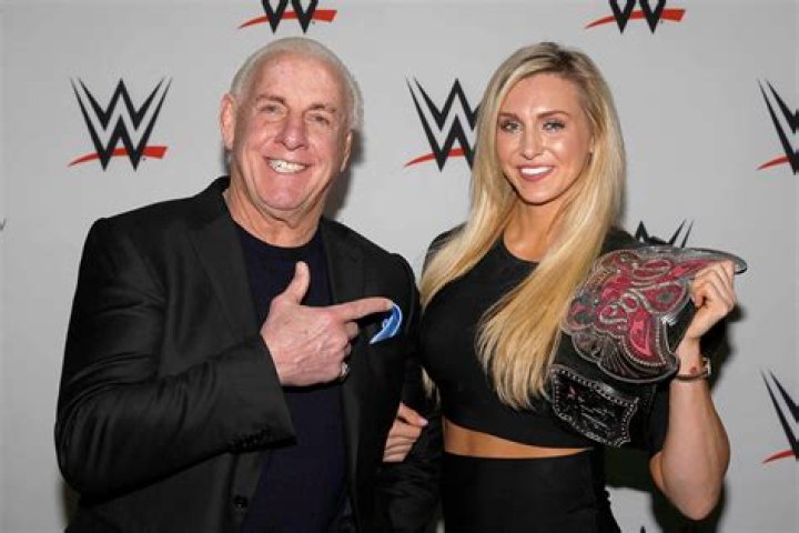 Charlotte Flair and Ric Flair