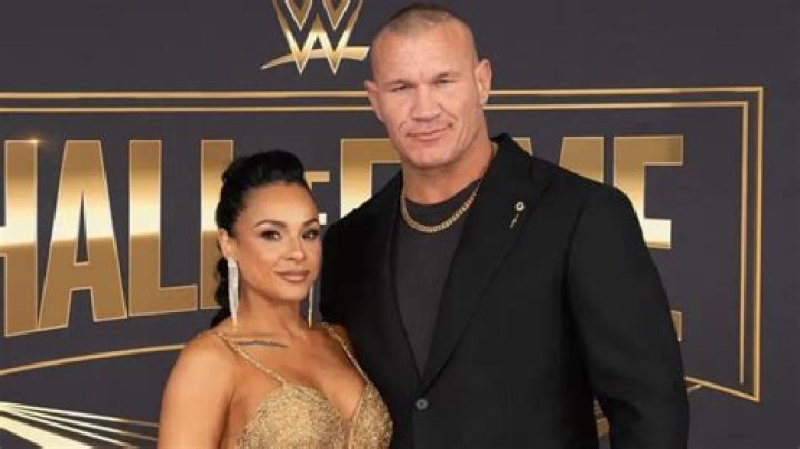 Charly Caruso and Randy Orton 