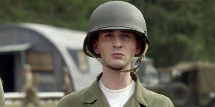 Chris Evans as Skinny Steve Rogers wearing an army uniform in Captain America: The First Avenger.