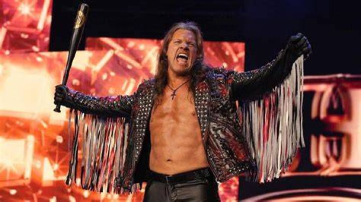 Chris Jericho in the ring sporting his fancy jacket