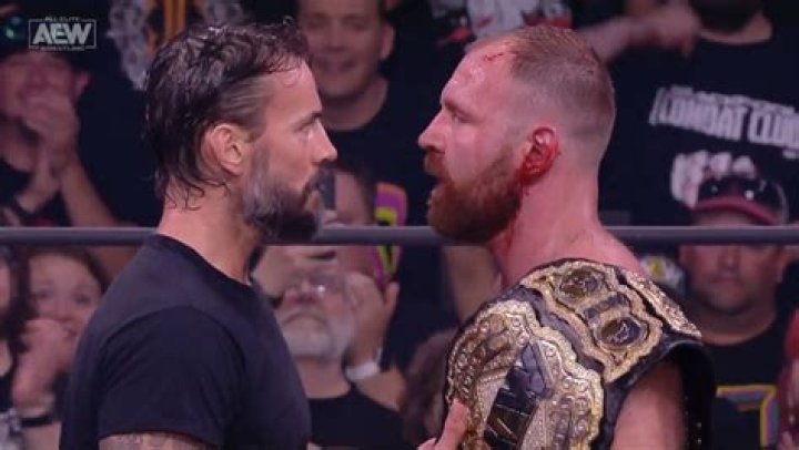 CM Punk and Jon Moxley face to face Cropped