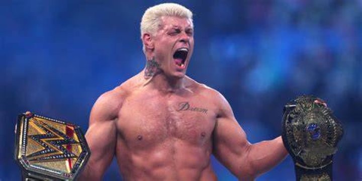 Cody Rhodes in a white suit, AEW