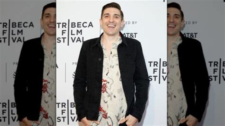 Comedian Andrew Schulz Celebrated His Marriage With A Jab At Harry & Meghan