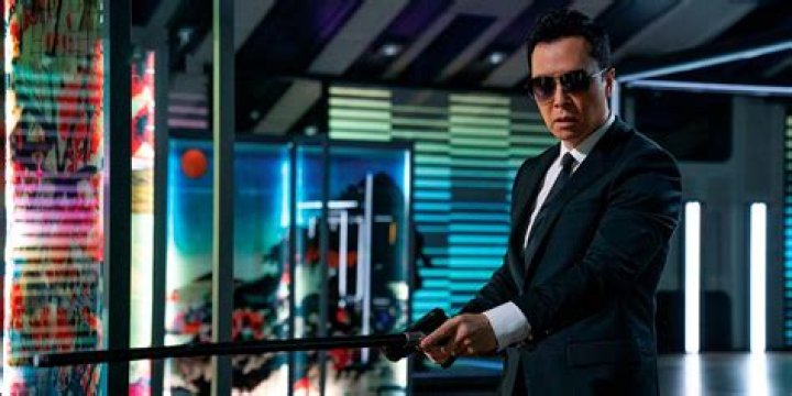 Donnie Yen with a gun in John Wick Chapter 4