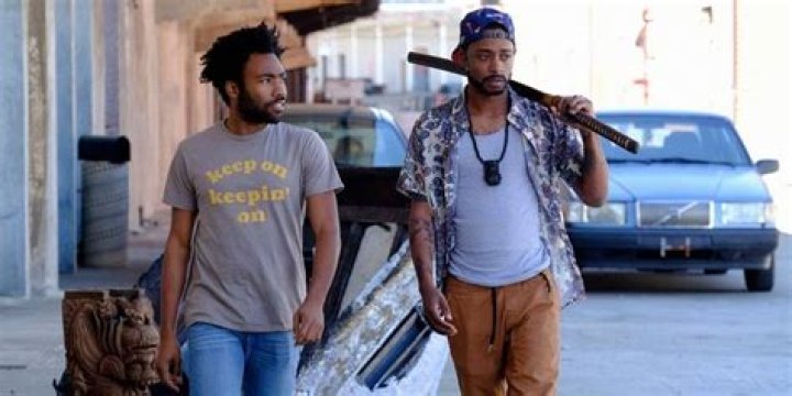Earnest and Darius walking together in Atlanta