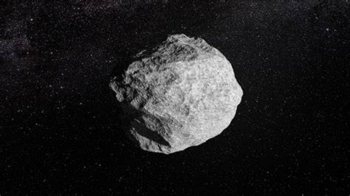 Ed and the asteroid capture ship in orbit above Mars
