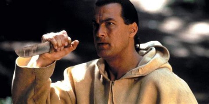Forrest fighting with a knife in On Deadly Ground.