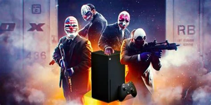 Four Payday 3 characters wearing masks. Two are holding assault rifles, while one of the two in the back has his hand resting on an Xbox Series X that's been edited into the image.