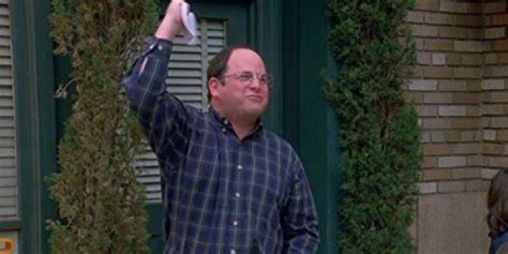 George Costanza raising his hand and shouting