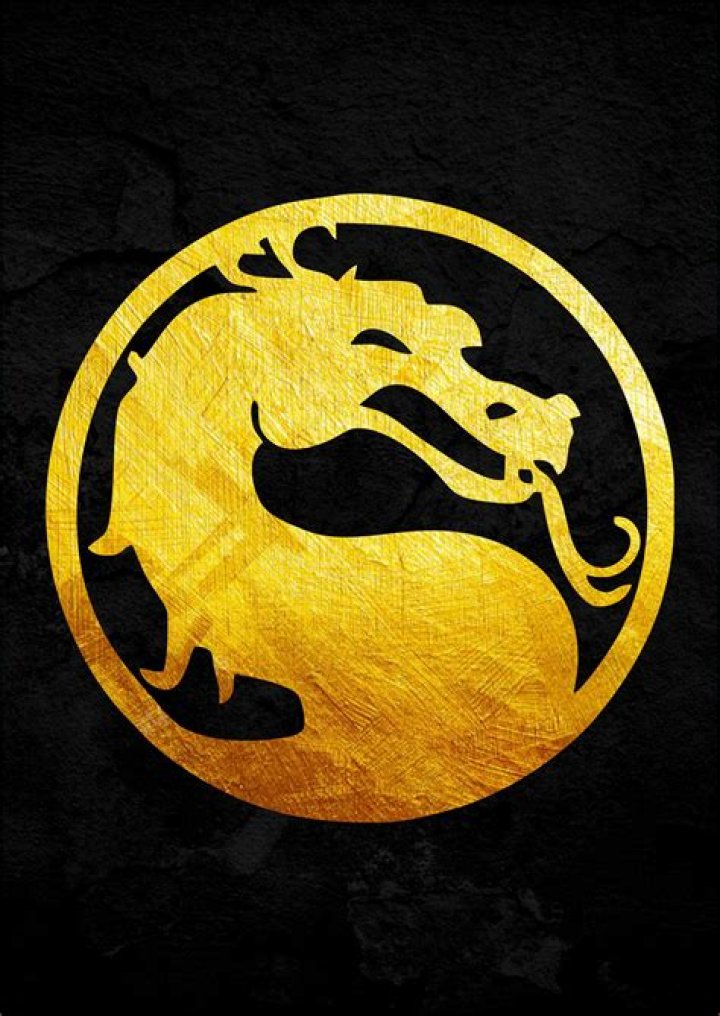 Gold Mortal Kombat Dragon on electric blue, lighning background with feint screenshots of past games.