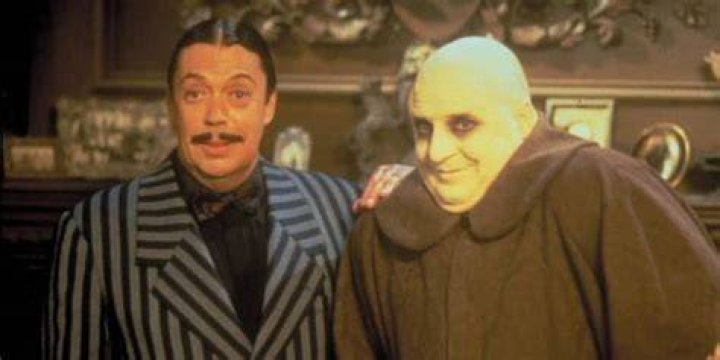 Gomez and Fester stand together in The Addams Family Reunion 