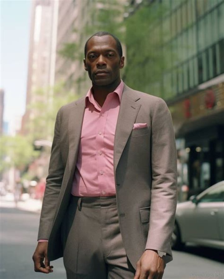 Grey Suit Pink Chair Fan Casting for Axel In Harlem | myCast