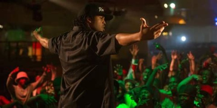 Ice Cube on stage hyping up the crowd in Straight OUtta Compton