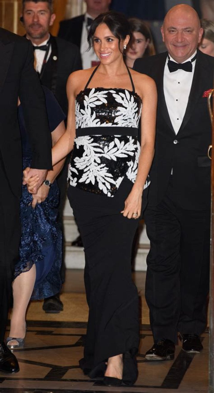 J.Law Flaunts Major Cleavage and Leg During London After-Party