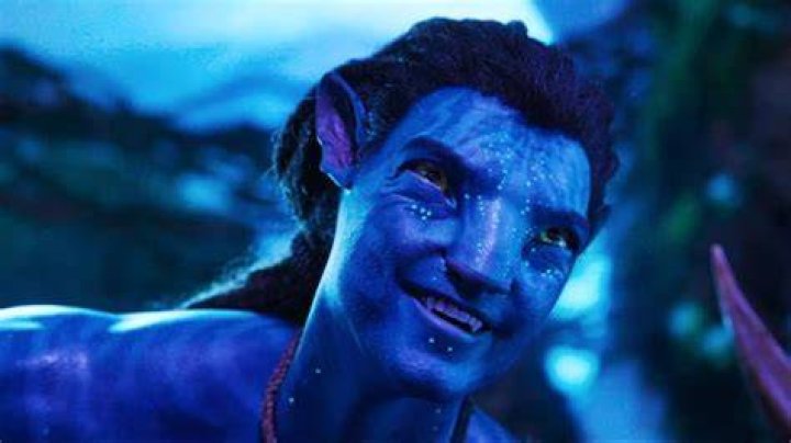 Jake Sully grins in Avatar: The Way of Water