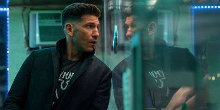 Jon Bernthal looks on in The Accountant 