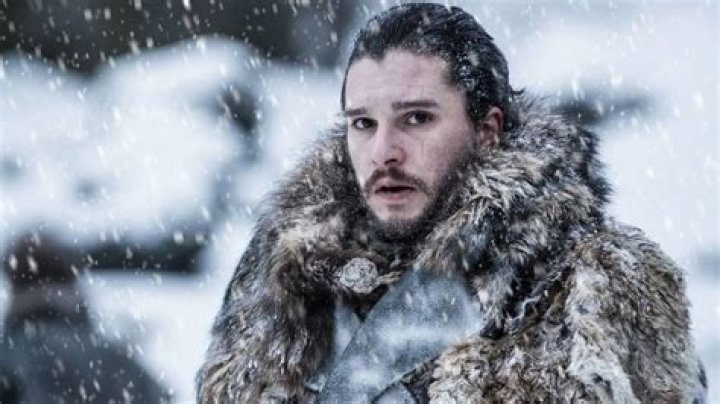 Jon Snow standing in the snow in Game of Thrones