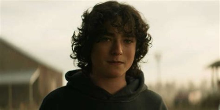 Jordan standing on the Kent farm property in Superman and Lois