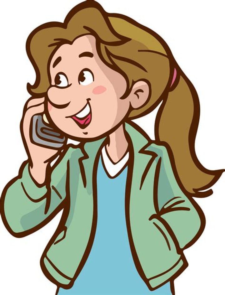 Julie on the phone with a client on The OC