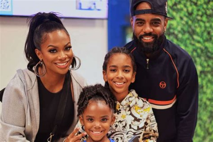 Kandi Burruss smiling for a promo photo for Real Housewives Of Atlanta