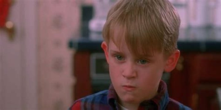Kevin looking at Buzz angrily in the kitchen in Home Alone