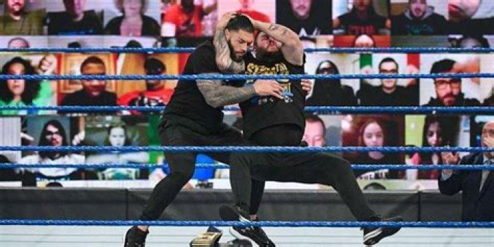 Kevin Owens hitting a Stunner.