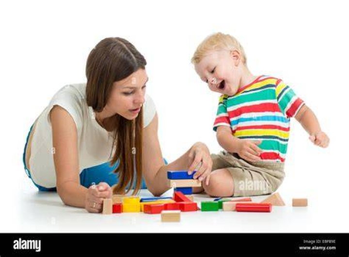 kid and his mom play toys together Stock Photo Alamy