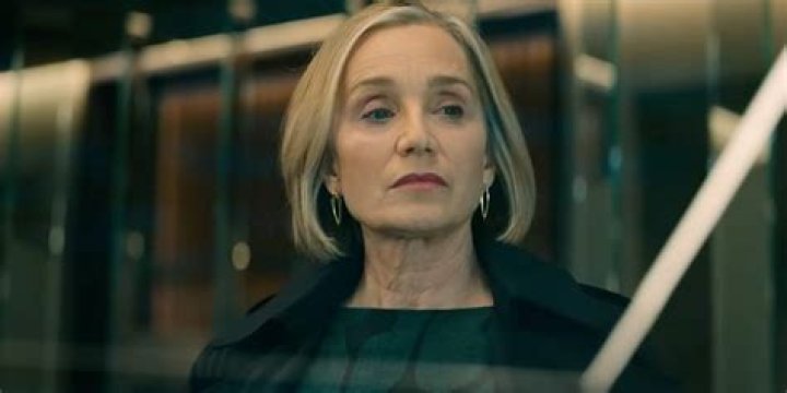 Kirstin Scott Thomas looking mysteriously off-screen in Slow Horses season 3.