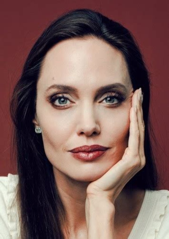 Laura Haddock as Angelina Jolie in Celebrity Lookalikes 