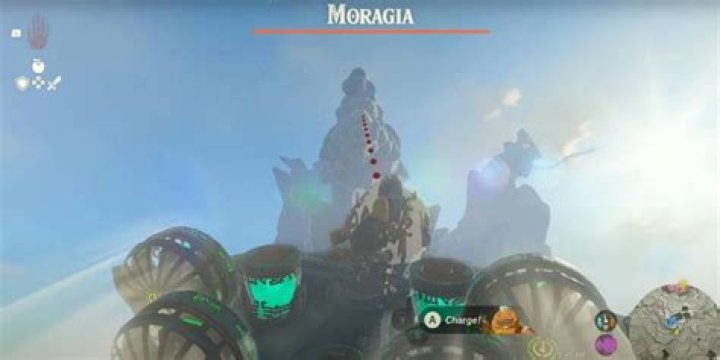 Link piloting an ancient Zonai aircraft while fighting Moragia in Tears of the Kingdom.