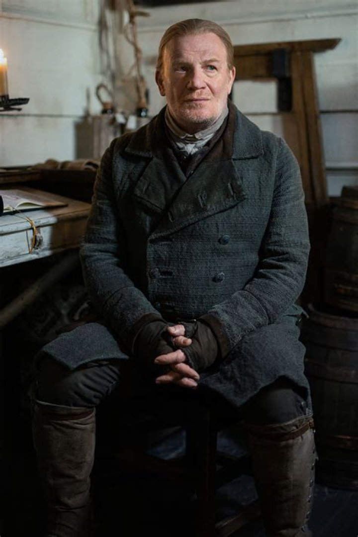 Mark Lewis Jones as Tom Christie in Outlander season 7