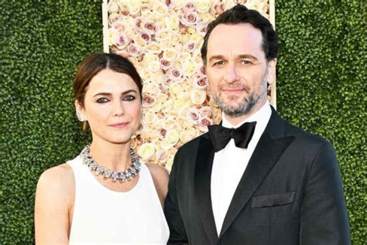 Matthew Rhys and Keri Russell on a stylized poster for The Americans